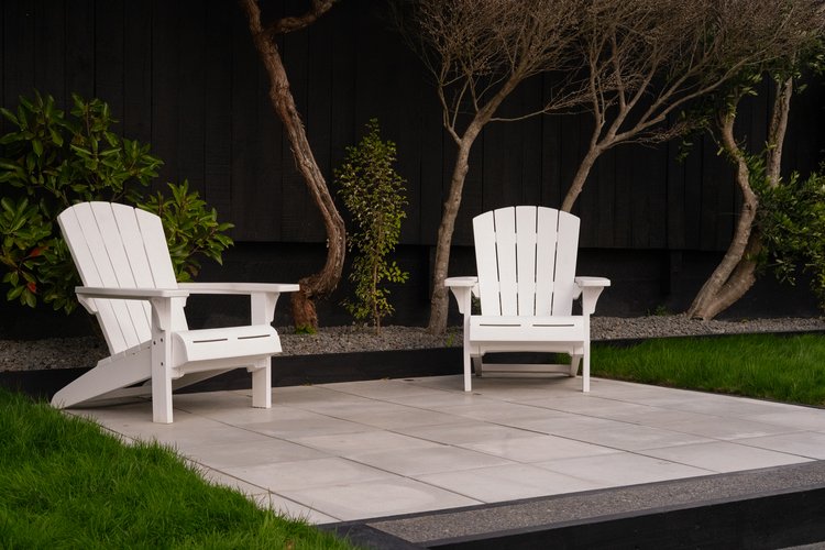 Outdoor patio area with raised garden bed
