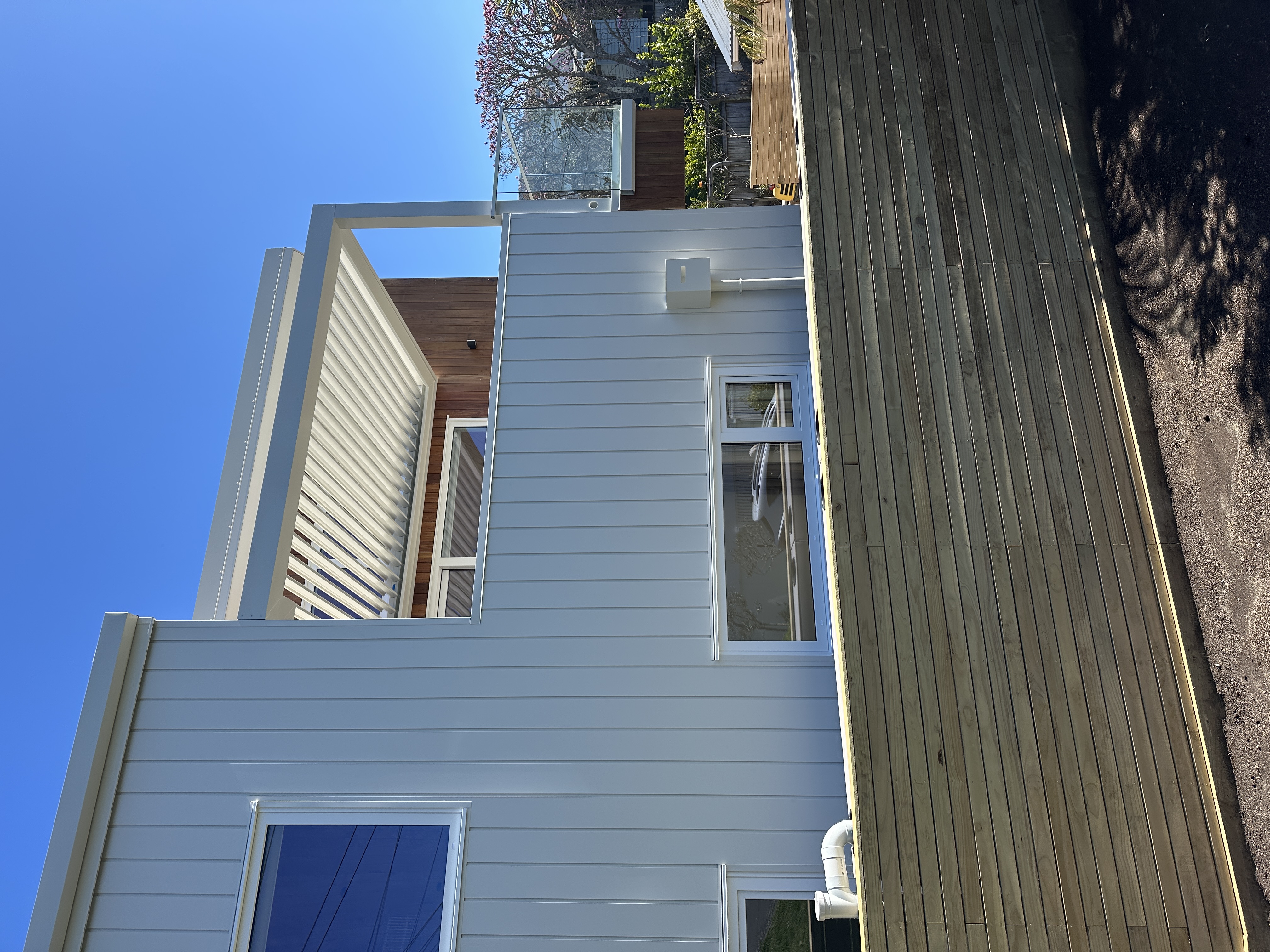 Evening view of opening roof with integrated lighting