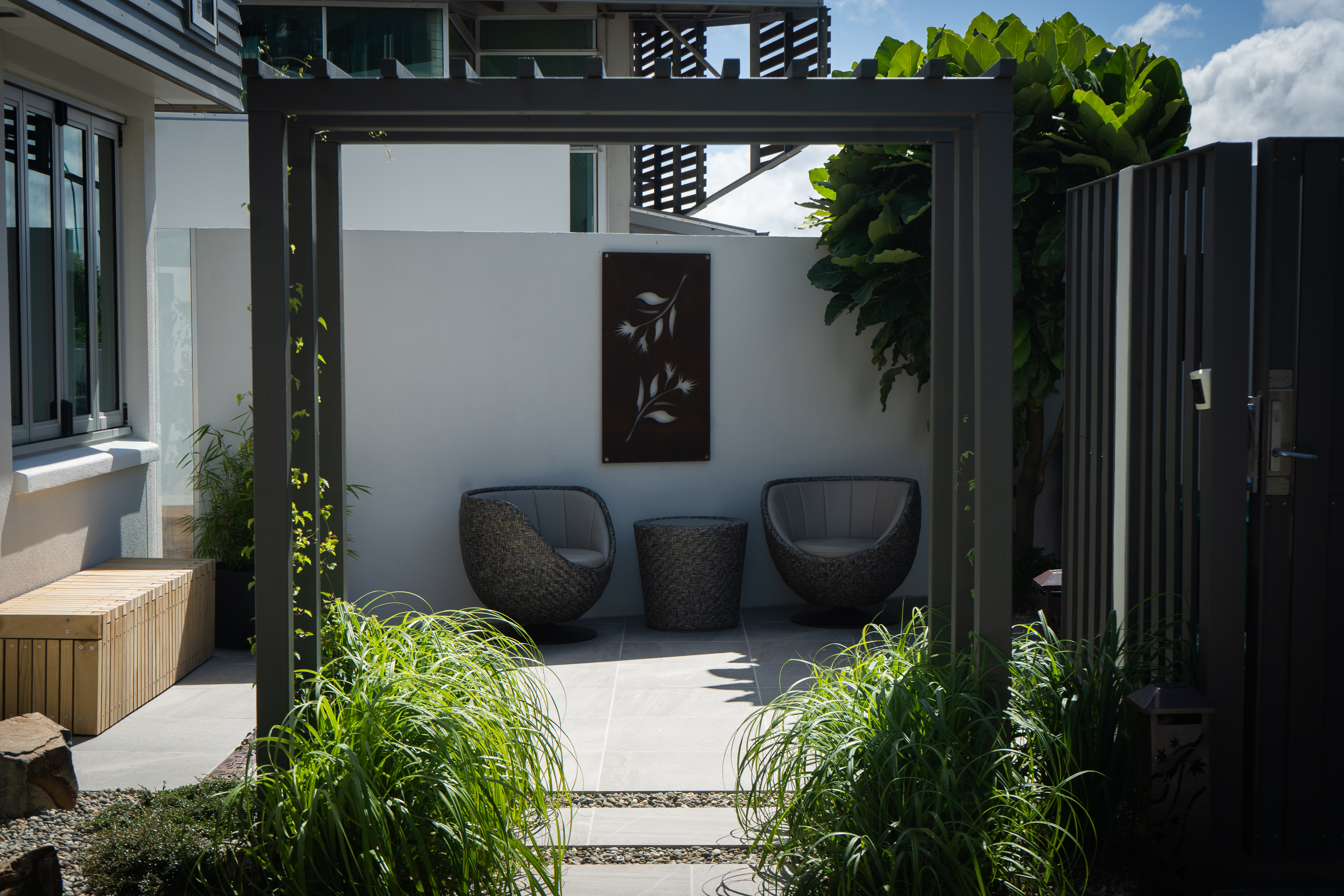 Courtyard detail showing stone paving and planting.