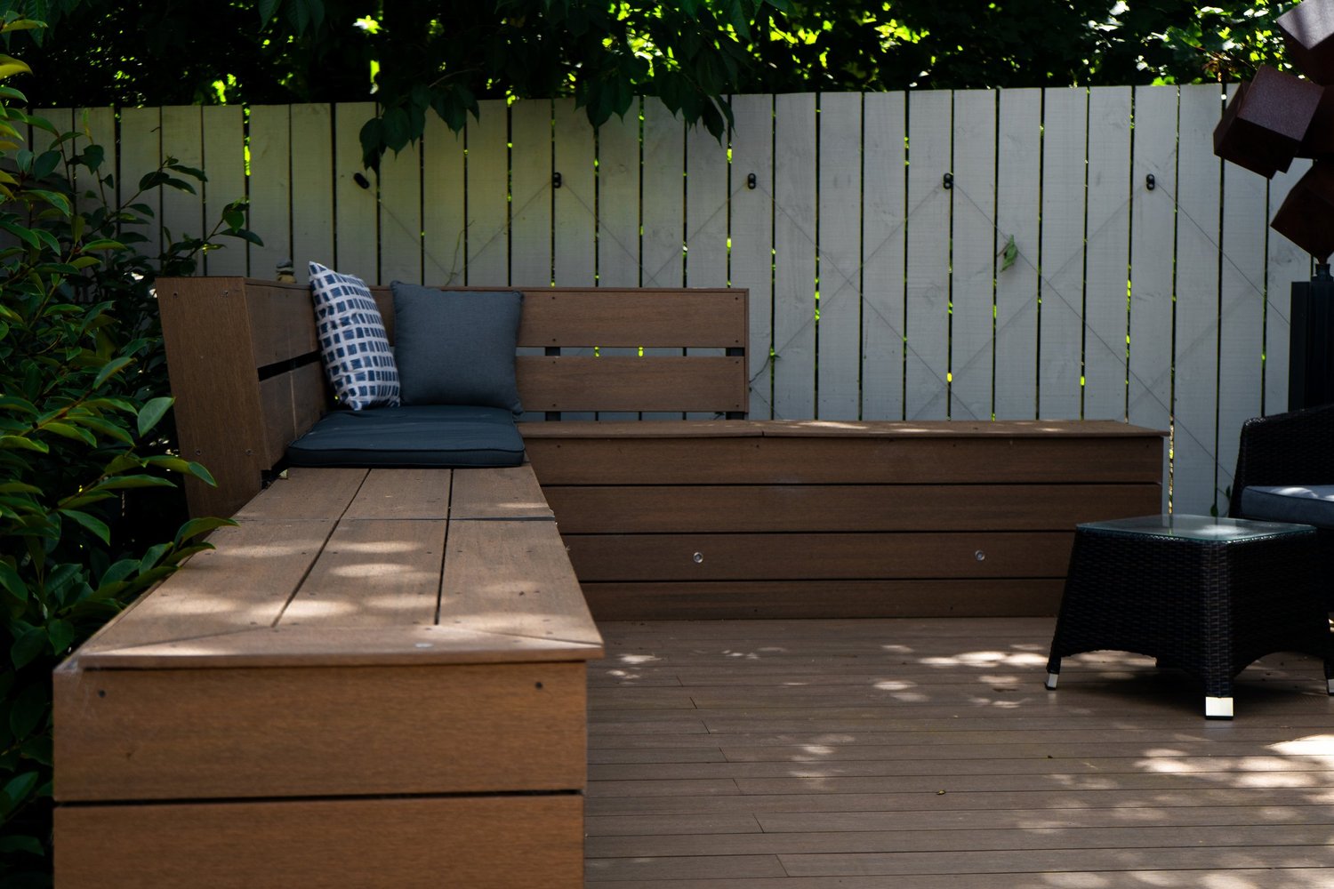 Cozy seating area under a white pergola
