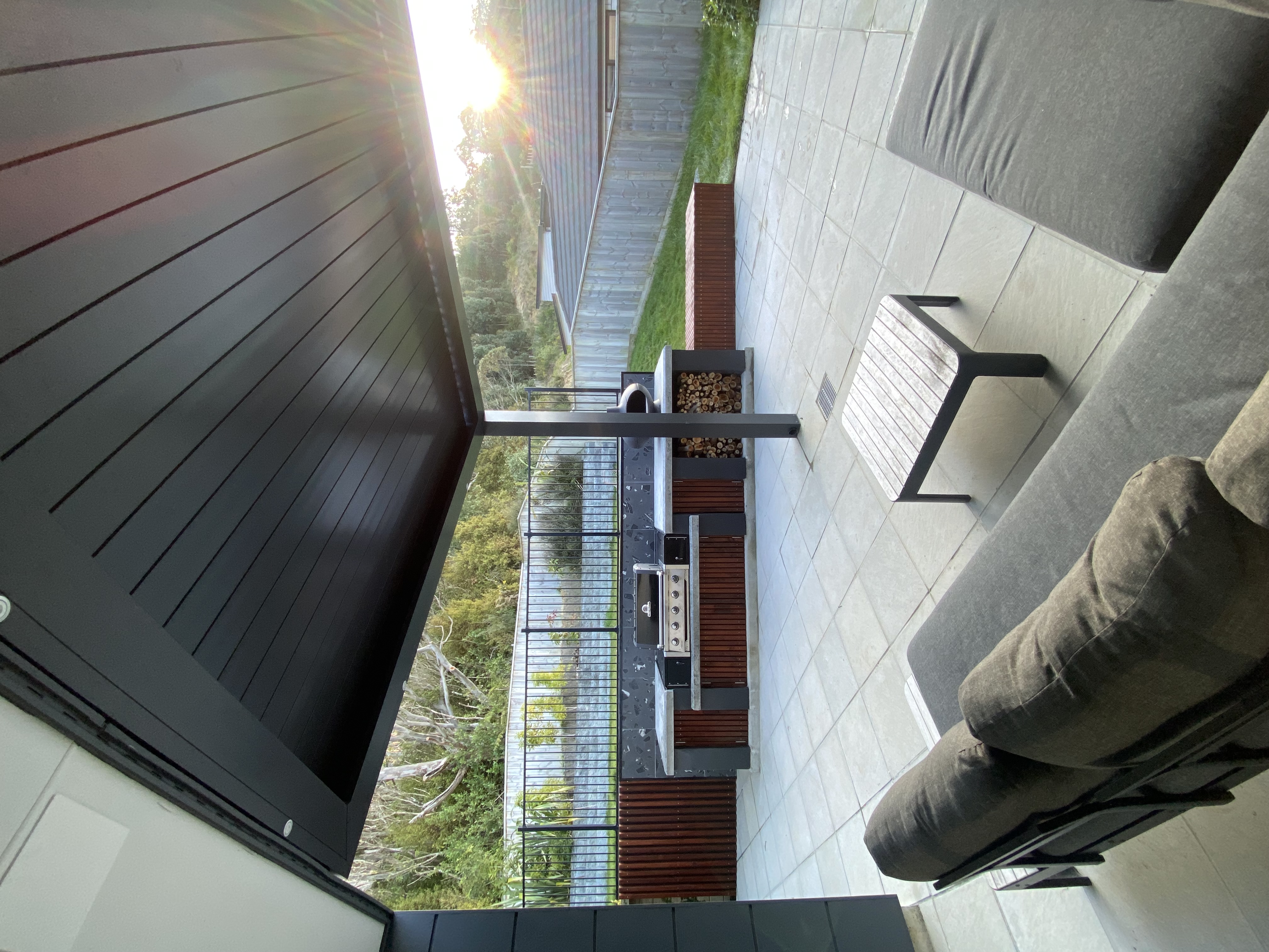 Detail shot of the custom wooden bench seating with integrated storage