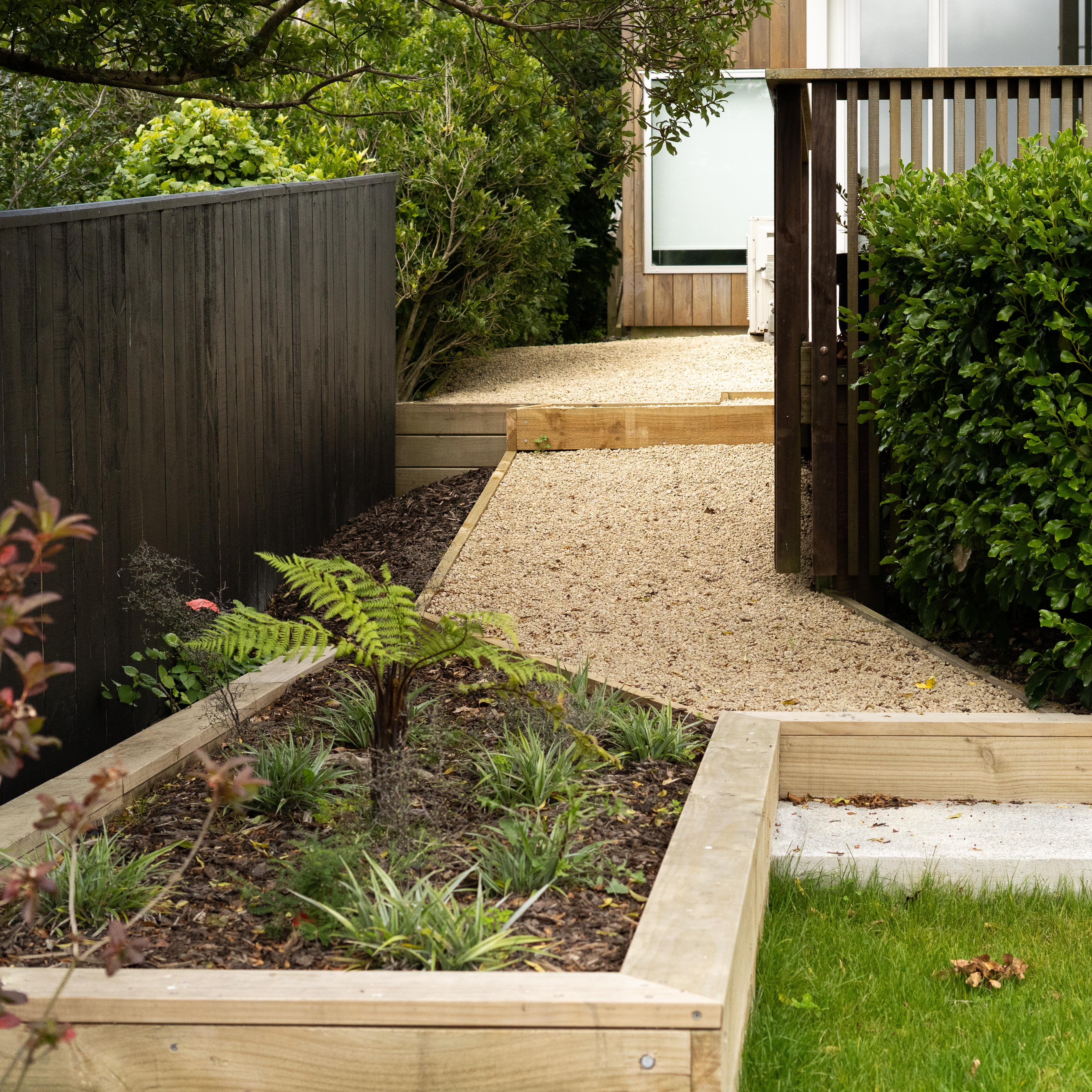 Small balcony with potted plants